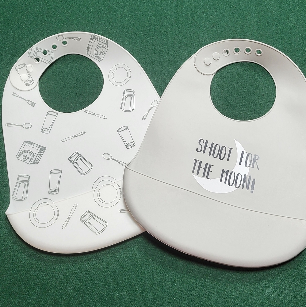 Two Lila & Jack silicone bibs